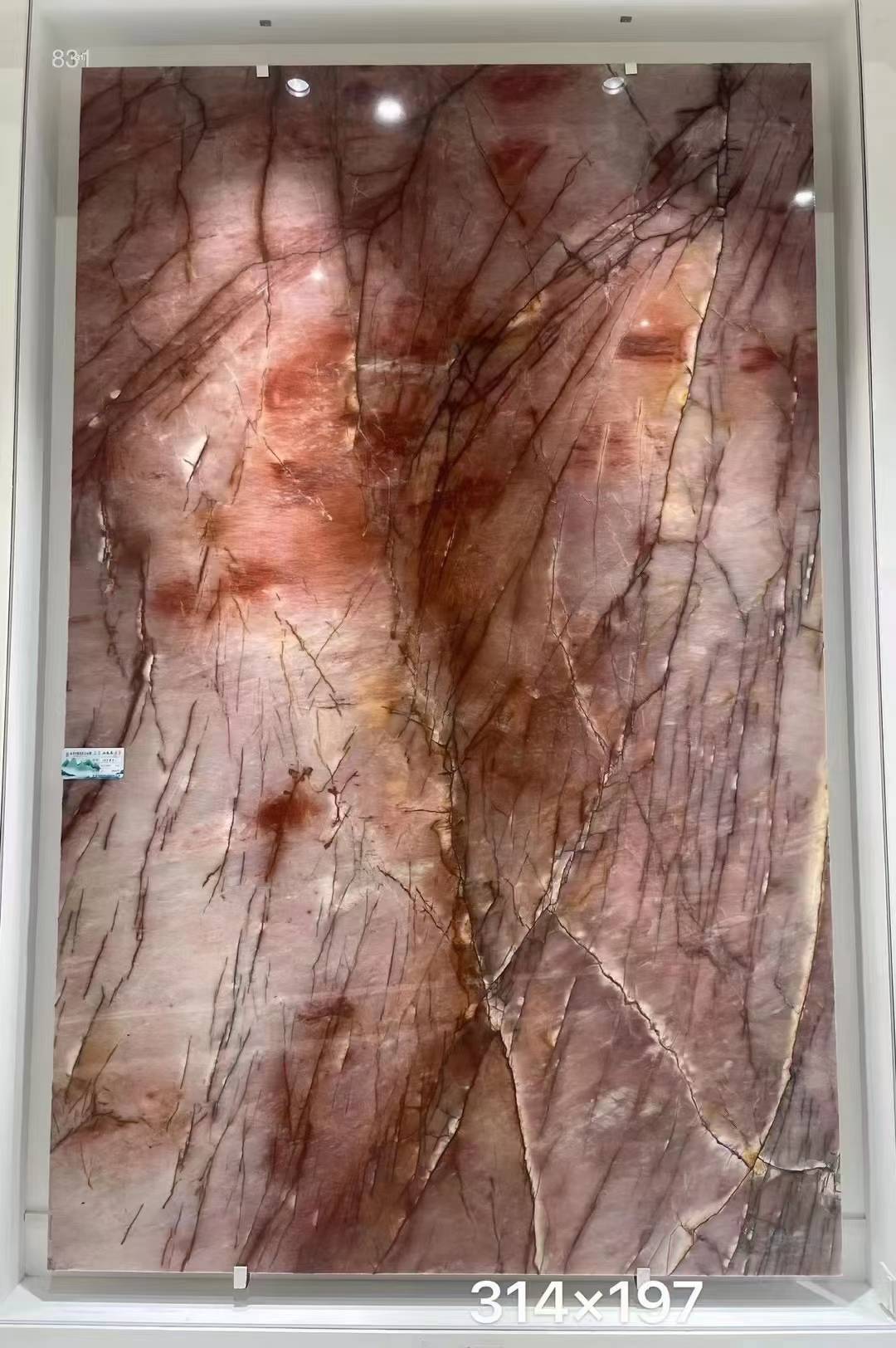 Cosmopolitan Quartzite big slabs fireplace walls