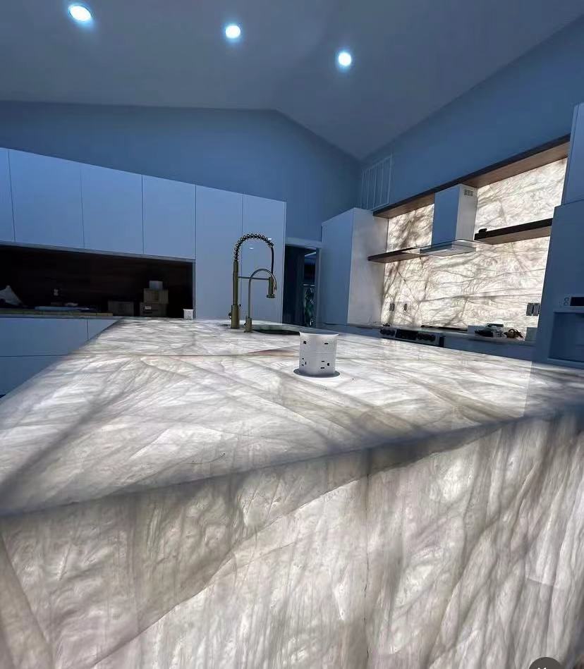 Crisallo Vittro Quartzite backlit island waterfall