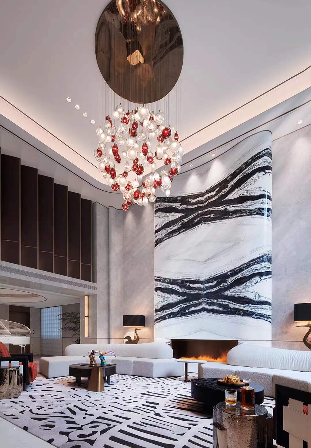 Dalmata granite bookmatched fireplace wall