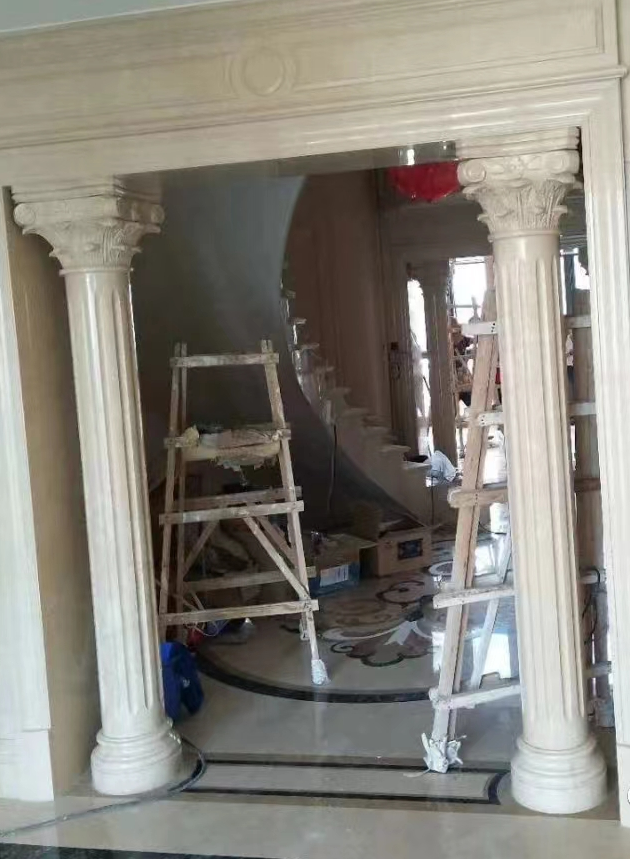 Marble column capital on entrance