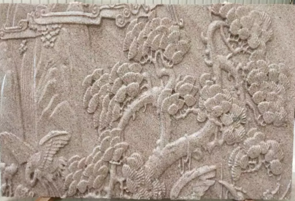 Outdoor engraved wall reliefs