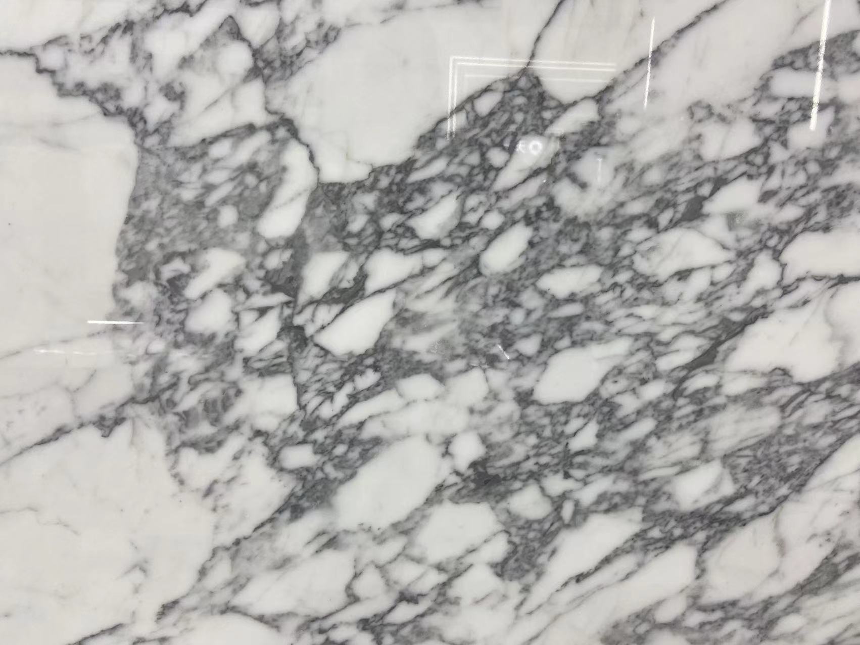 Statuarietto Bianco Marble bookmatched slabs