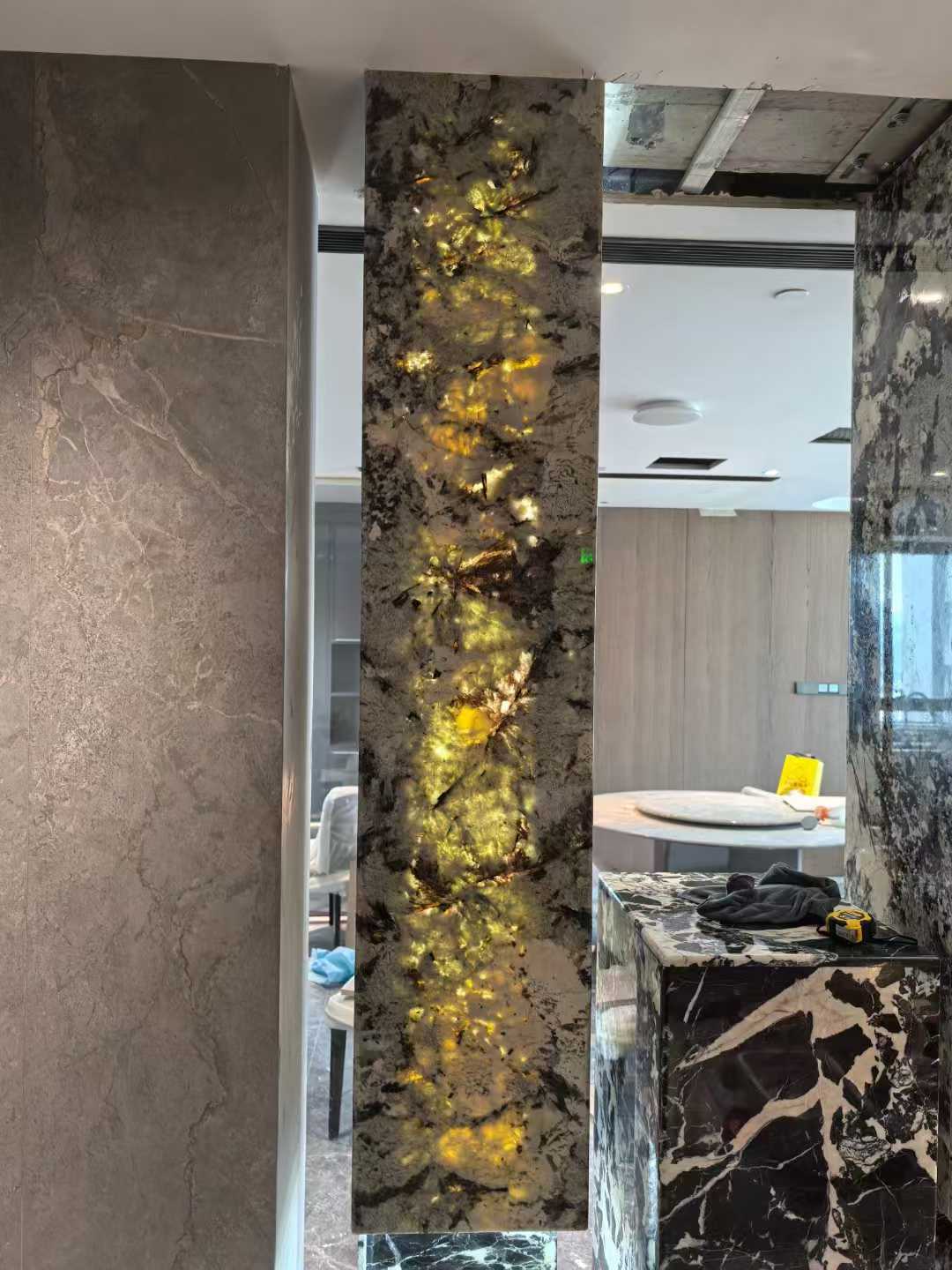 alpinus white granite slab backlit wall living room