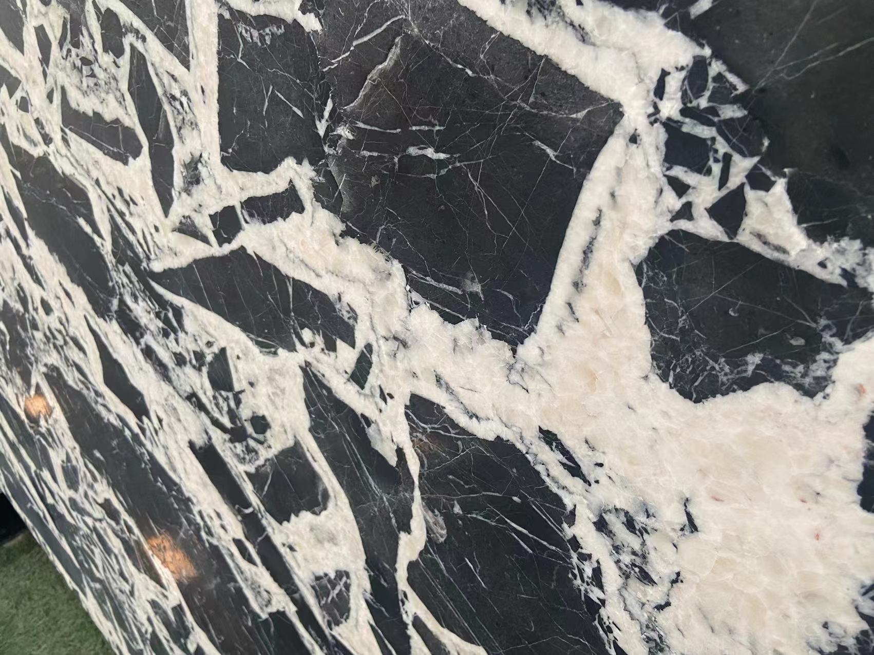 black and white marble leathered slabs