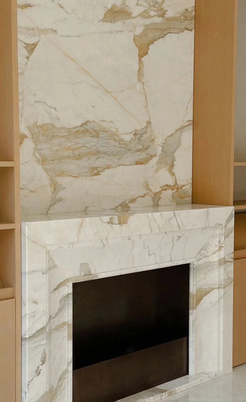 calacatta gold marble fireplace surround