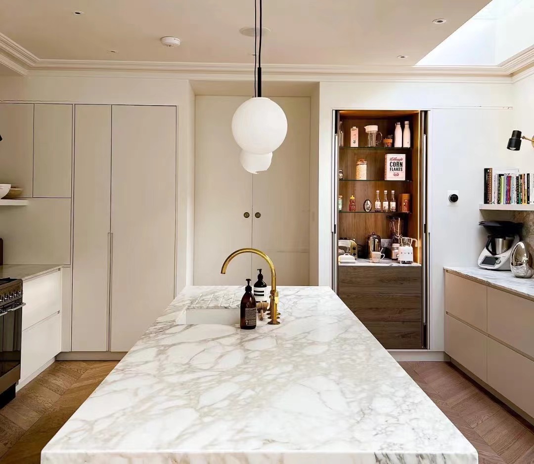 calacatta gold marble kitchen island