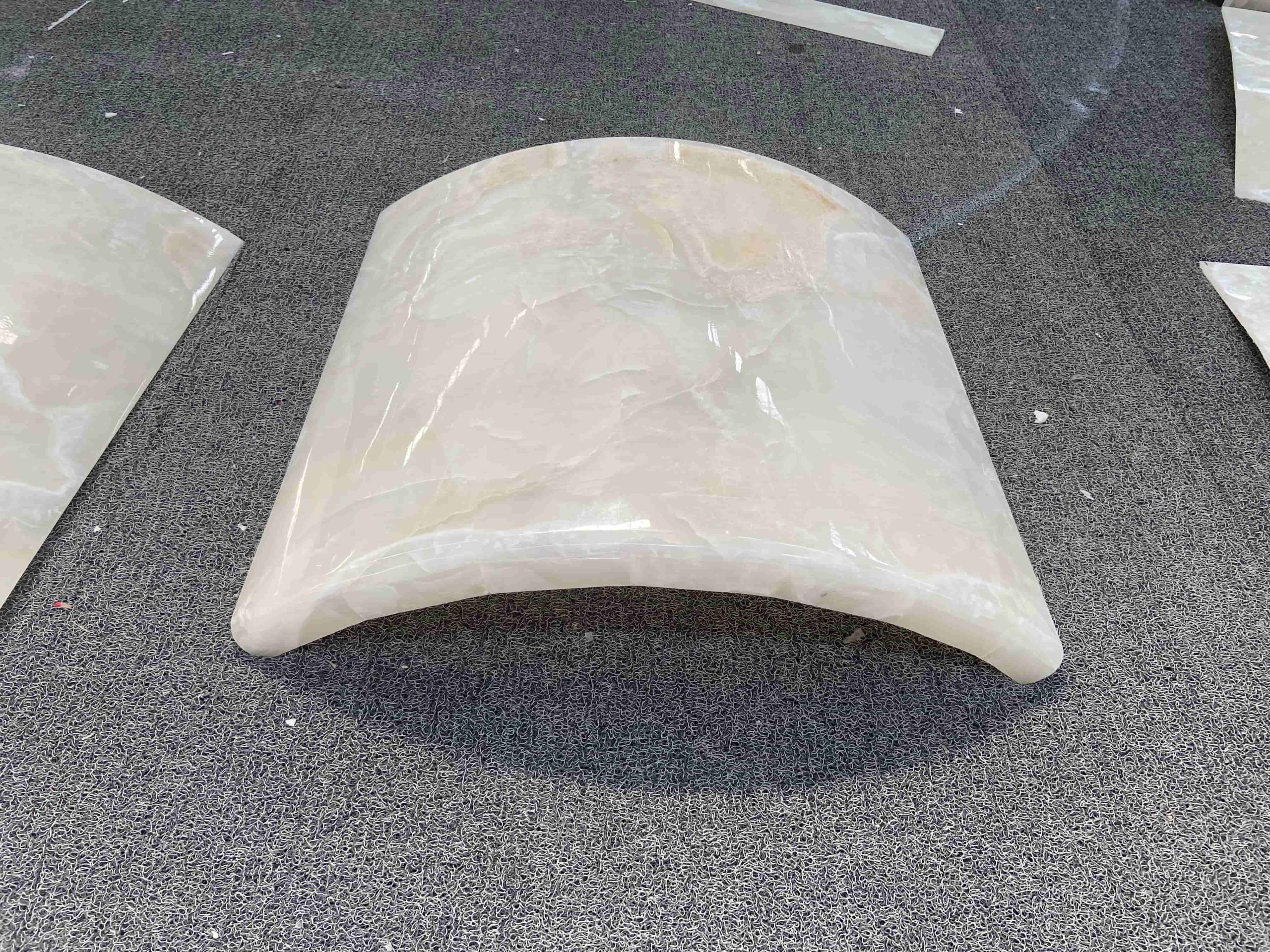 curved onyx stone wall