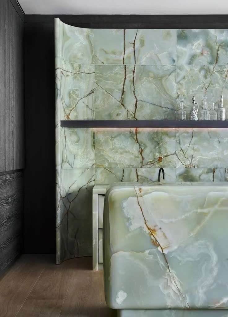 Green onyx reception to be matched the same green onyx wall  