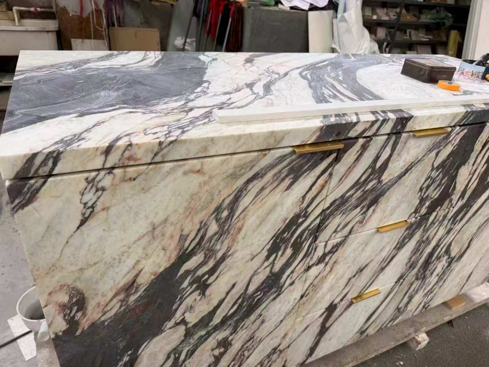 Smaller size brass handle to be used in marble furniture all cabinets wrapped with stone.